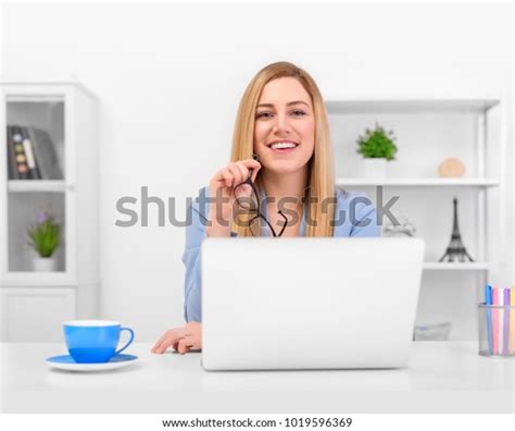 Attractive Blonde Blue Suit Sitting Office Stock Photo 1019596369 Shutterstock