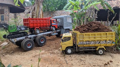 Lokalan Muat Tanah Bertemu Truk Fuso Raksasa Keluar Dari Bengkel