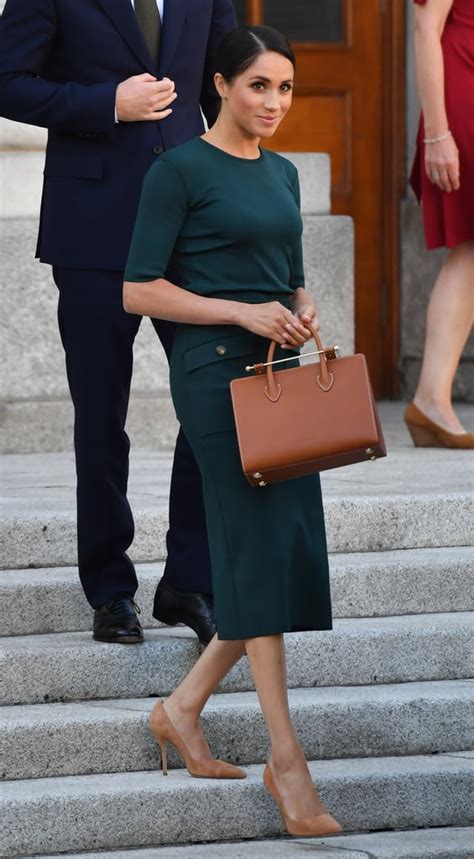 ‎meghan Markle Carrying A Strathberry Midi Tote Bag In Tan Bridle