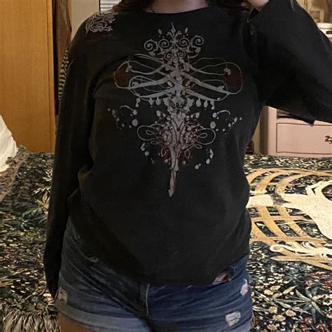 Long sleeve grey sweater Has a bunch of cool designs... - Depop