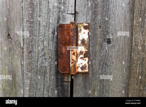 Old Rusty Metal Door Hinge Door Hinge On A Wooden Door Stock Photo Alamy