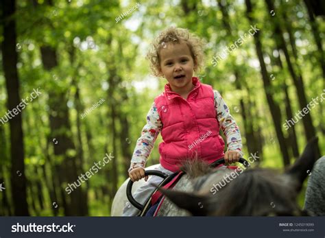 Girl Enjoying Horseback Riding Woods Young Foto Stock 1245019099