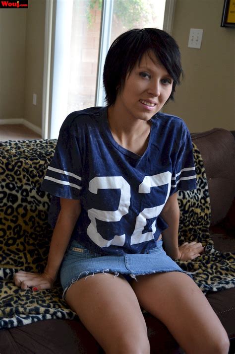 Short Haired Brunette Babe Shows Her Legs On The Couch 15 Photos