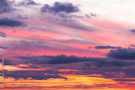 Beautiful Soft Dramatic Sunset Orange Pink Sky With Clouds Background