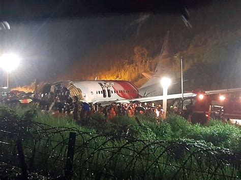 Pictures Dubai Kerala Air India Express Flight Crashes Splits Into