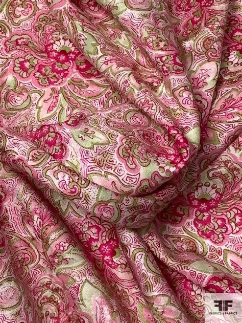 A Pink And Green Paisley Print Fabric