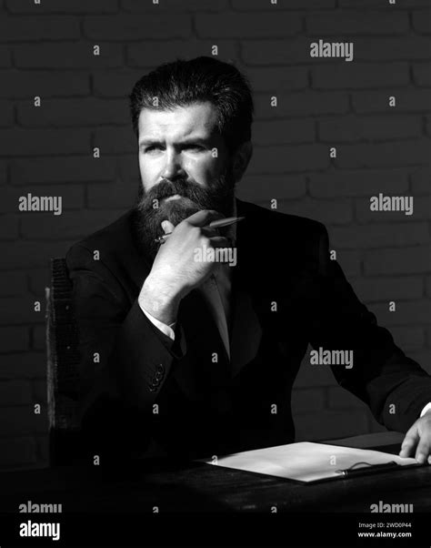 Portrait Of A Teacher Or Professor At Classroom Satisfied Serious Mature Teacher Mature