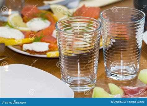 Two Empty Glasses On A Dining Table Stock Image Image Of Glasses Slices 305887353