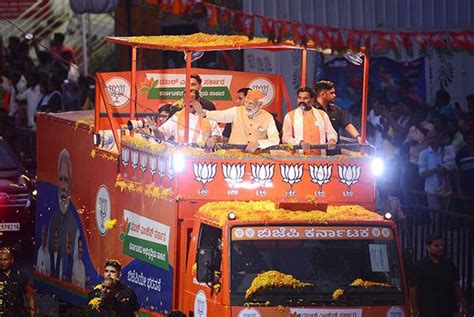 Pm Modi Takes Out Mega Roadshow In Bengaluru