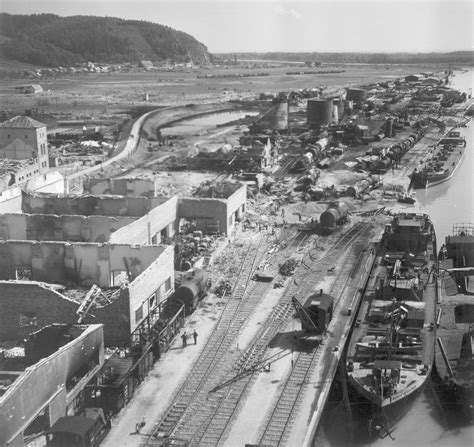 The aftermath of the 9th Air Force aircraft bombing of the oil depot at Deggendorf, Germany, in ...