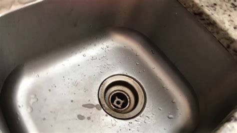 How To Unclog A Kitchen Sink Using Baking Soda And Vinegar Youtube