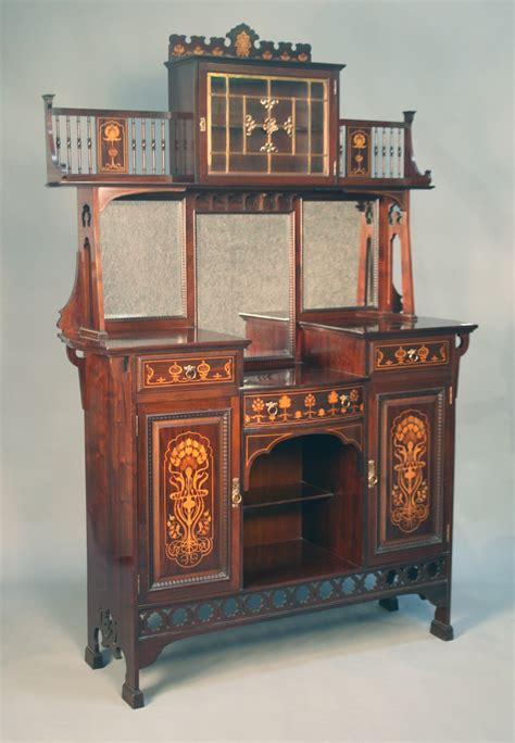 An Art Nouveau Mahogany Side Cabinet By Shapland And Petter Of