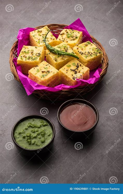 Gujarati Khaman Dhokla Or Steamed Gram Flour Puffy Snack Cake Stock