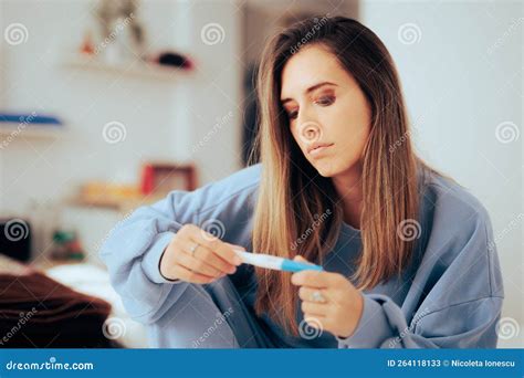 Woman Checking The Results Of A Pregnancy Test At Home Stock Image Image Of Motherhood