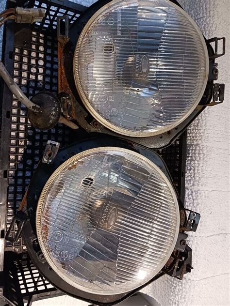 Ford Escort Mk2 Round Carello Headlamps And Back Bowls Steel EBay