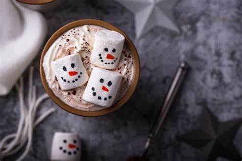 Premium AI Image Hot Chocolate With Snowman Marshmallow