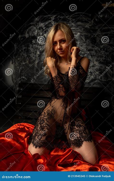Blond With Beautiful Hair In White Lingerie And Transparent Lace Dress Stock Image Image Of