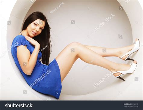 Sexy Brunette Blue Dress Sitting Circle Stock Photo 261286550 Shutterstock
