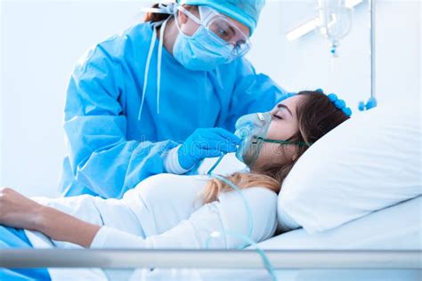 Nurse Adjusting A Positive Pressure Oxygen Mask Stock Image Image Of