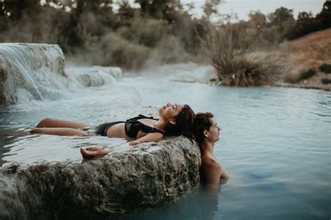 Couple In Water Stunning Photos In A Hot Spring Hot Springs Spring Photoshoot Italian