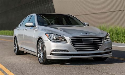 Download The Silver Hyundai Genesis Is Driving Down The Road