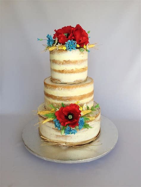 Naked Wedding Cake With Meadow Flowers Decorated Cake CakesDecor