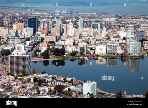 Aerial of The Downtown Oakland, California Skyline from over Lake ...