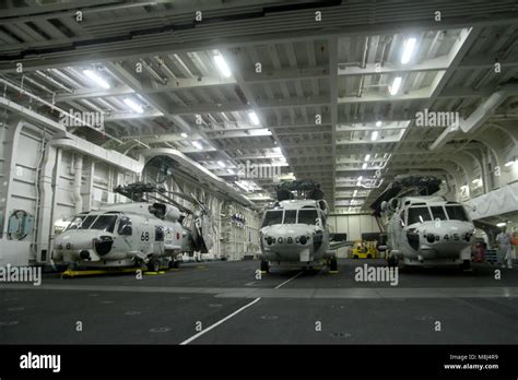 Inside Helicopter carrier Izumo's hangar bay Stock Photo - Alamy