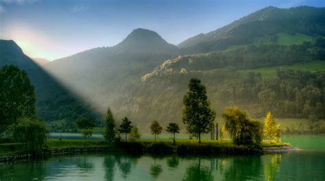 Hintergrundbilder Sonnenlicht Landschaft Hügel See Natur