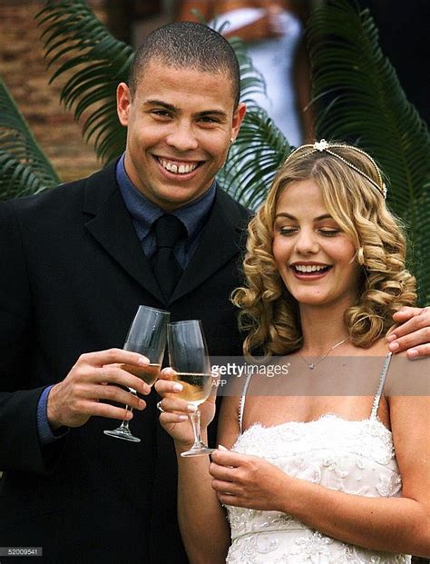 Soccer player Ronaldo is shown with his wife, Milene Domingues during...