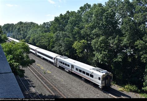 NJT Comet V Cab Car 6043 Trailing On NJT Train 5425 After Departing