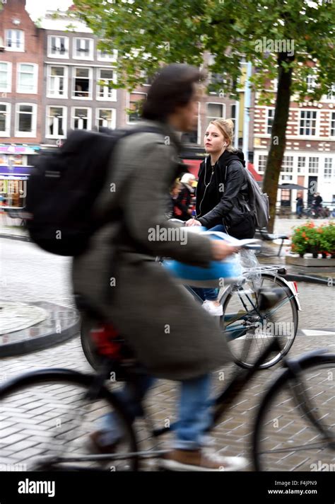 Bicycles In The Rain Nieuwmarkt Amsterdam The Netherlands Holland