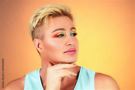 Beauty Fashion Guy With Colorful Art Makeup Blonde Hair Sexy Man With Bright Make Up Portrait