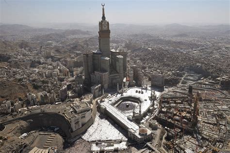 An aerial view shows the Mecca Clock Tower as Muslim pilgrims walking ...