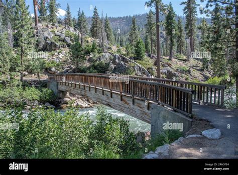 A Wooden Bridge Over The Middle Fork Of The Stanislaus River In The