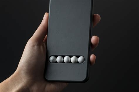 Вещь дня: дизайнерский телефон с каменными шариками — Wylsacom