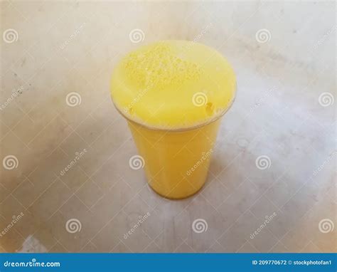 Yellow Foam Science Experiment Overflowing Cup In Plastic Container