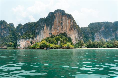 Travel, sea and rocky mountains in Thailand 7233842 Stock Photo at Vecteezy