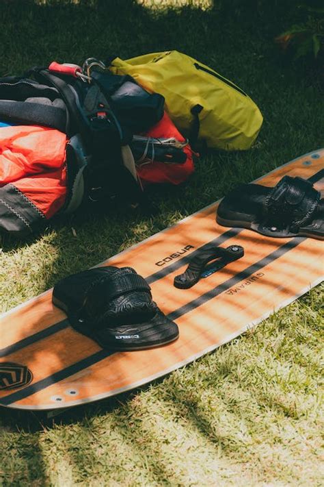 Surfing Equipment on Grass · Free Stock Photo