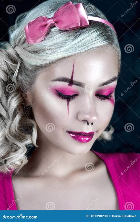 Beautiful Blonde Girl With Two Pigtails With Creative Doll Make Up Pink Glossy Lips Wearing