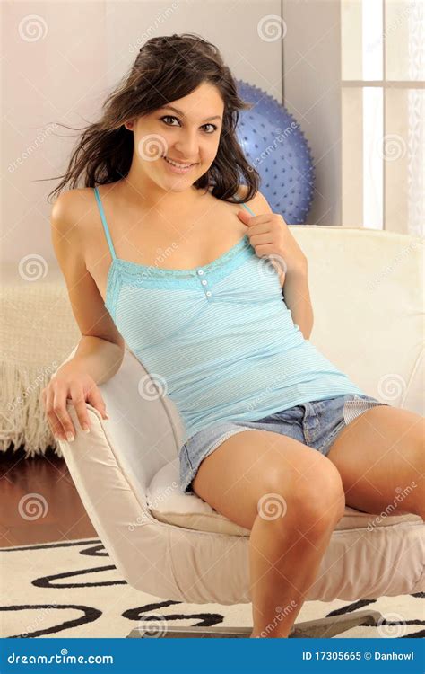 Smiling Teen Sitting stock image. Image of female, sensuality - 17305665