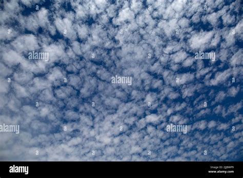 Altocumulus Castellanus Fair Weather Clouds in Blue Sky Stock Photo - Alamy