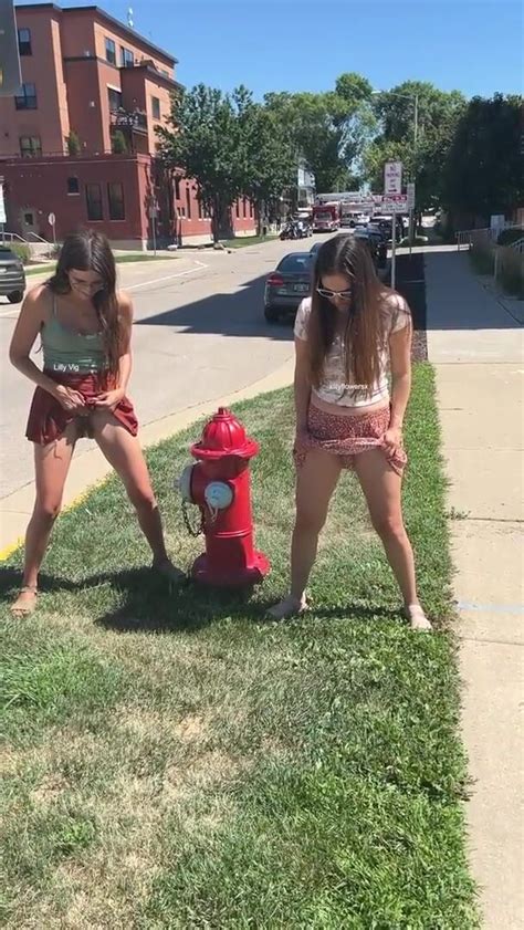 Girls Pee Standing By Fire Hydrant