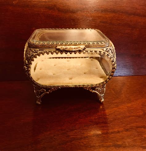 Vintage Gold Ormolu Jewelry Casket Gold Filigree Trinket Box Beveled Glass And Tufted