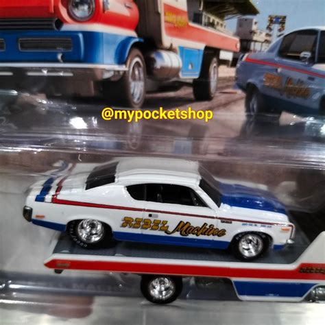 12 25 Hot Wheels AMC REBEL MACHINE WIDE OPEN HAULER 2022 Hotwheels Team Transport