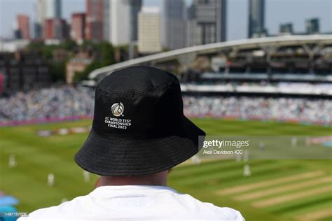 A spectator, wearing a ICC World Test Championship Final 2023 Bucket ...