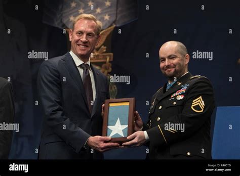 U S Deputy Secretary Of Defense Inducts U S Army Staff Sgt Ronald J