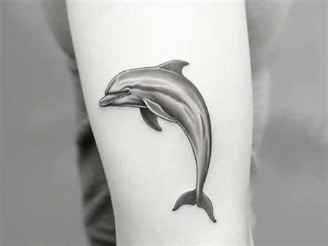 Exploring The Depths The Symbolic World Of Dolphin Tattoos