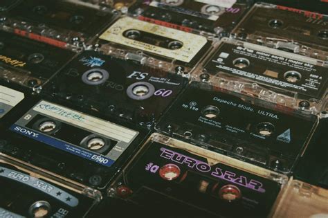 Collection of old audio tapes with titles in apartment · Free Stock Photo