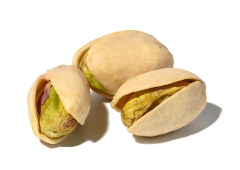 Premium Photo Salted Open Inshell Pistachios Isolated On A White